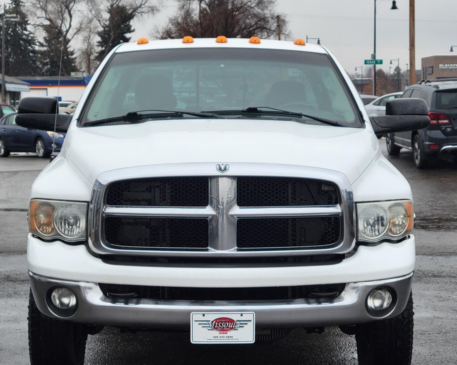 2005 White /Black Dodge Ram 3500 SLT (3D7LS38C85G) with an 5.9L I6 24V Cummins engine, 6 Speed Manual transmission, located at 450 N Russell, Missoula, MT, 59801, (406) 543-6600, 46.874496, -114.017433 - Photo #2